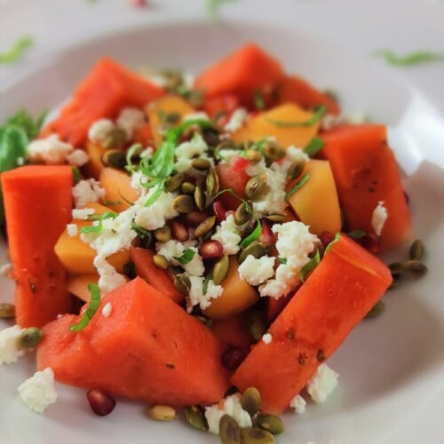 melon salad with feta cheese and pumpkin seeds