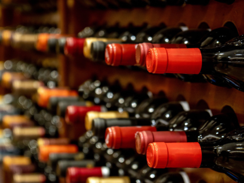 wine bottles on wine storage rack for EXPLORING DRINKS