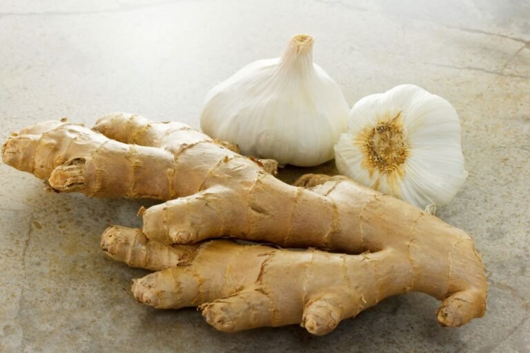 whole garlic and ginger on the countertop