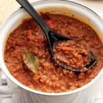 Traditional Bolognese Sauce rich in lycopene-heavy tomatoes and heart-healthy herbs for a balanced diet.