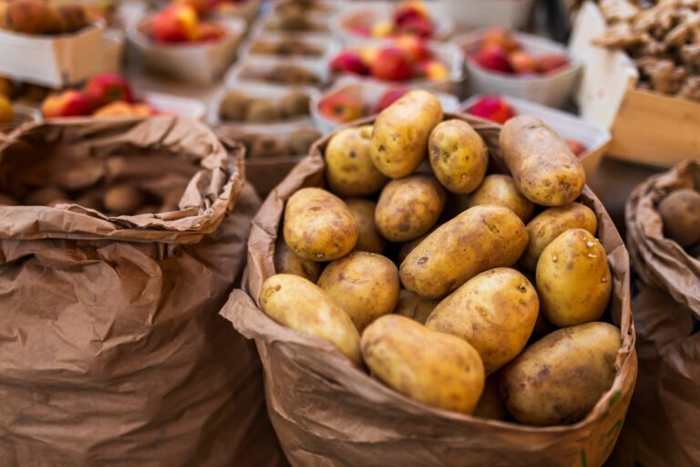 Whole potatoes with skins on, showing the natural source of potato health benefits